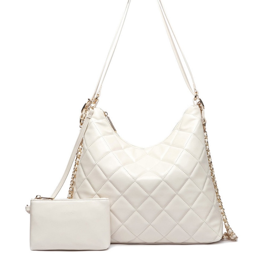 Like Dreams NWT Fortune Puffer Sling bag NWT in ivory.